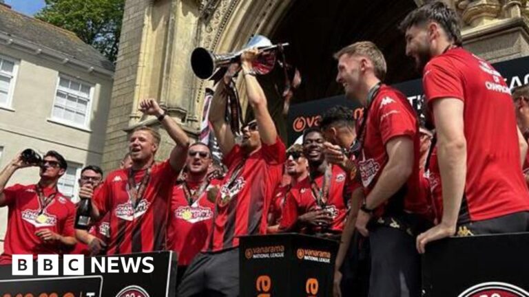 Truro City's Triumph: Bus Parade Celebrates Promotion!